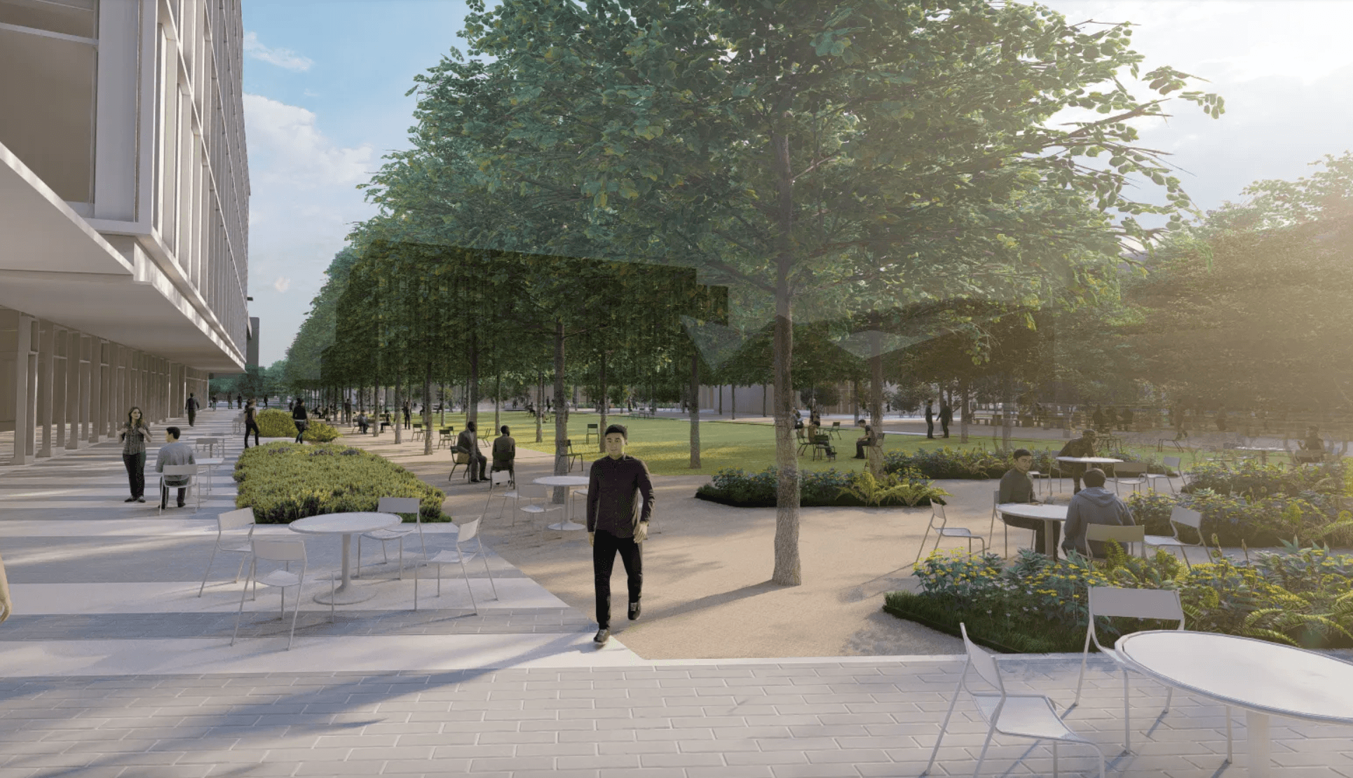 courtyard with people sitting and walking with lush green space